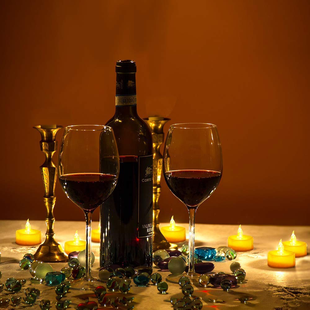 Nancia 100-Pack Flameless LED Tea Light Candles, Realistic Flicker, 200H Long-Lasting, Battery Operated, Warm Yellow for Home, Party & Wedding