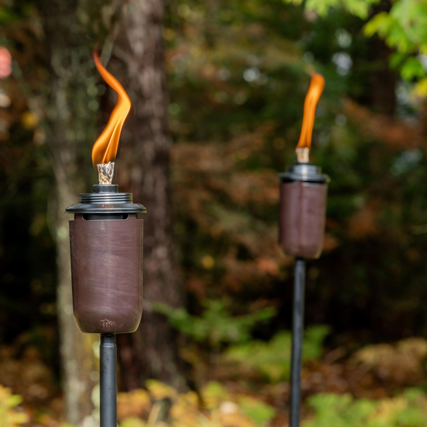 TIKI 2-Pack Honey Copper Outdoor Torches – Decorative Patio & Garden Torches with Long-Lasting Wicks, Snuffer, Weather-Resistant Bronze Finish